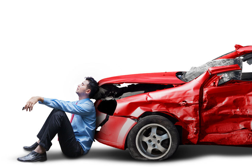 Frustrated person and broken car isolated Picture of frustrated businessman with broken car after traffic accident, isolated on white background